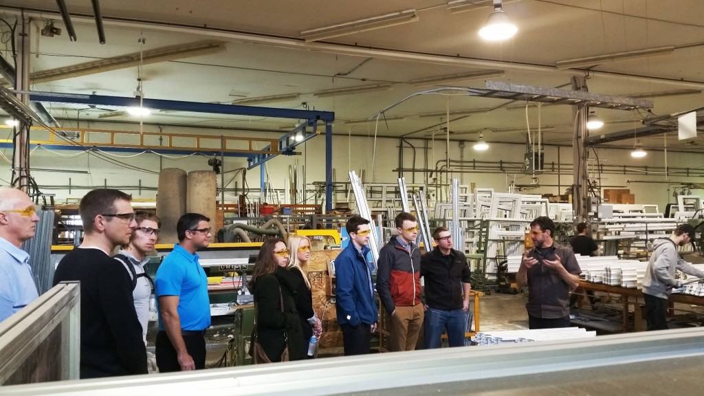 home builders on a tour of a window factory